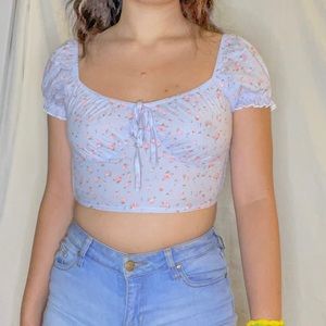 Isabelle’s cabinet purple floral milkmaid top